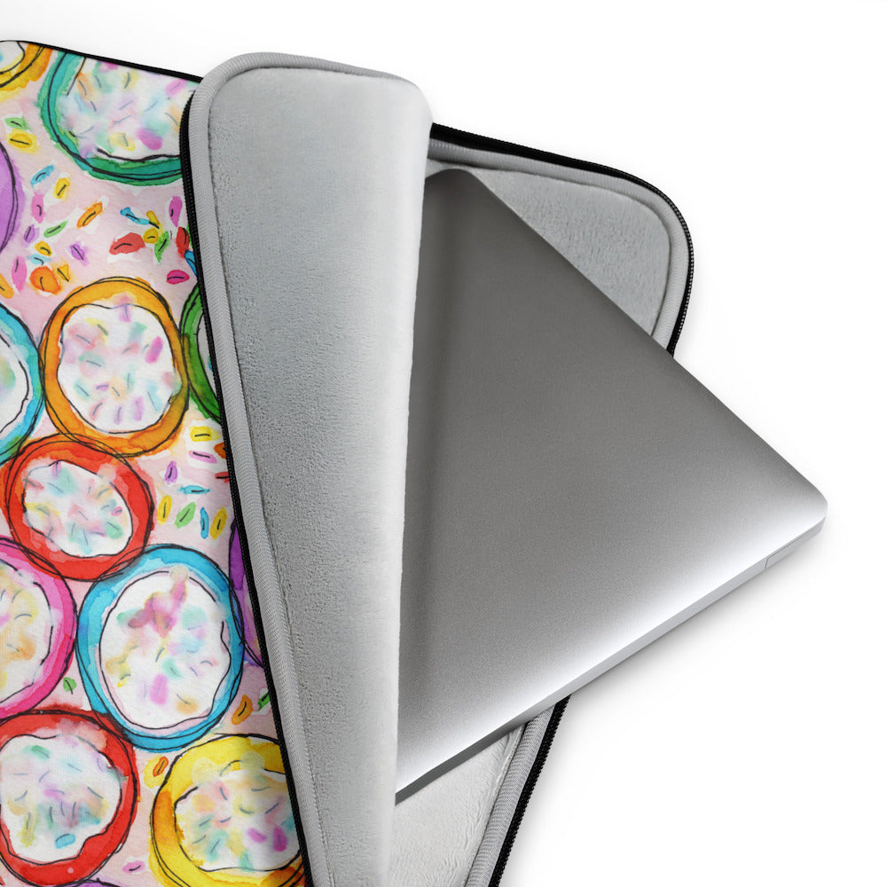 Soft furry lining in gray color of graphic laptop case with rainbow-inspired multicolor print in Frosted Cookies, 15 inch size.