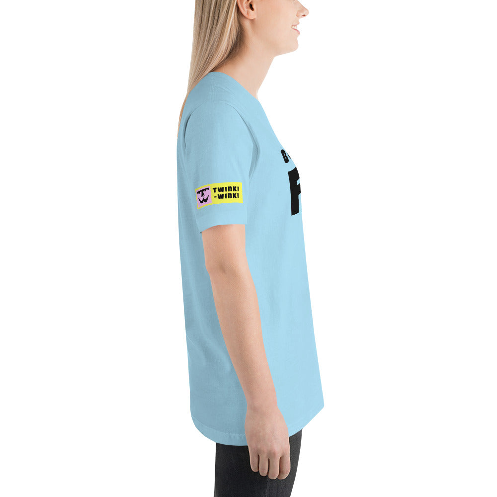 Young woman right side wearing cotton slogan tee in light blue color with slogan Born To Be Fab in black letters on front.
