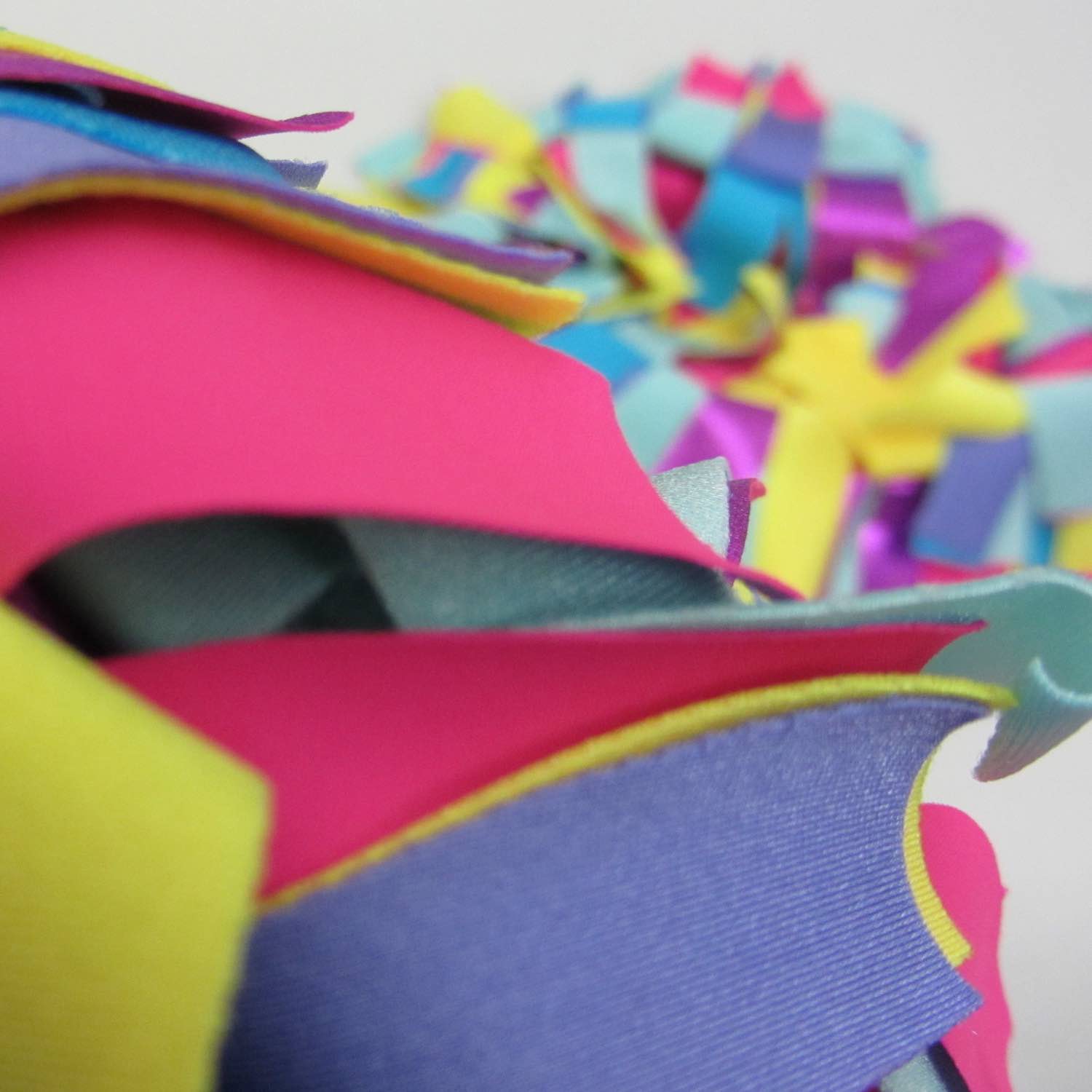 Detail of colorful and stylish soft lush fashion boa scarf in yellow, aqua, pink colors limited edition Twinki-Winki view 2.