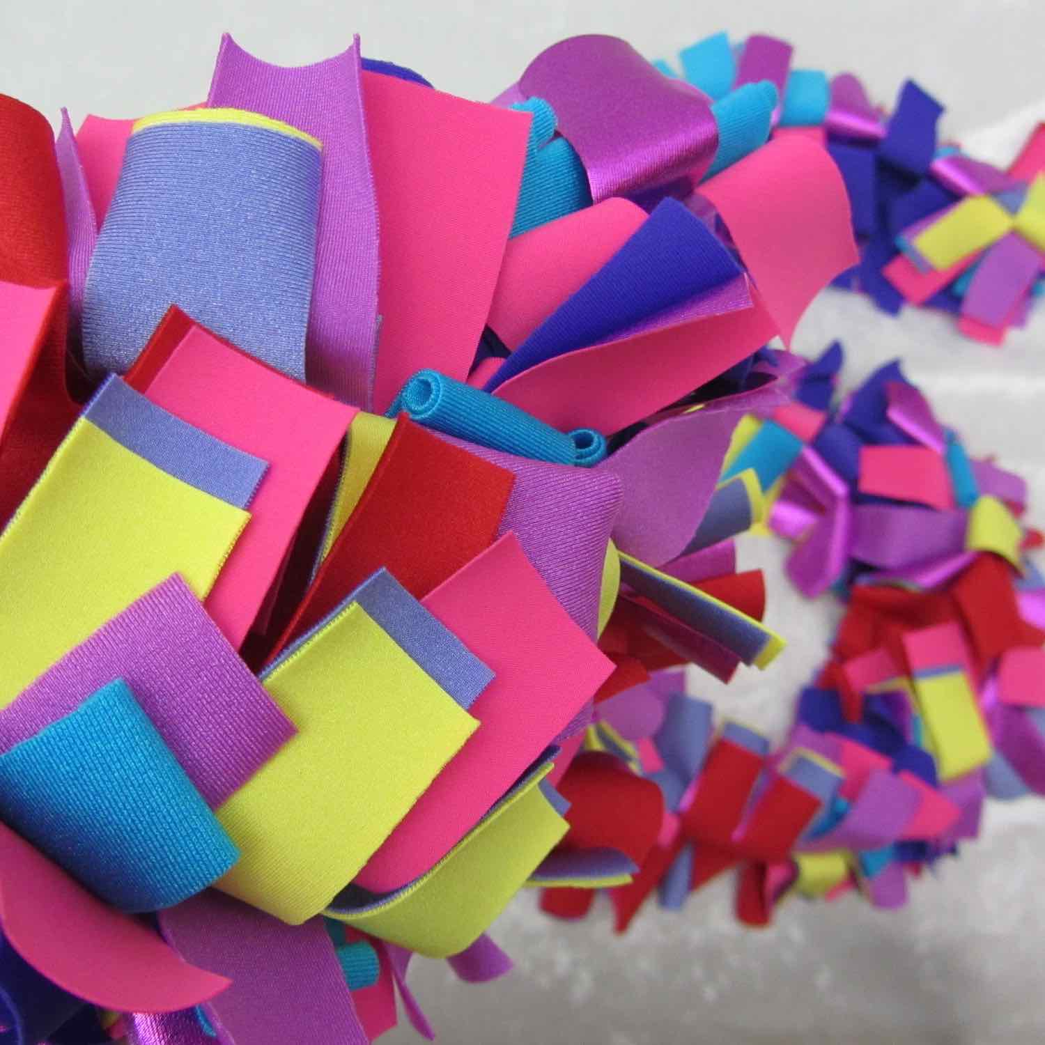 Detail of colorful and stylish soft lush fashion boa scarf in yellow, purple, pink colors limited edition Twinki-Winki view 1.