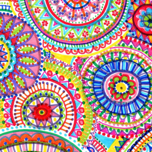 Colorful drawing with markers of multiple mandalas filling the page by Alex Mitchell.