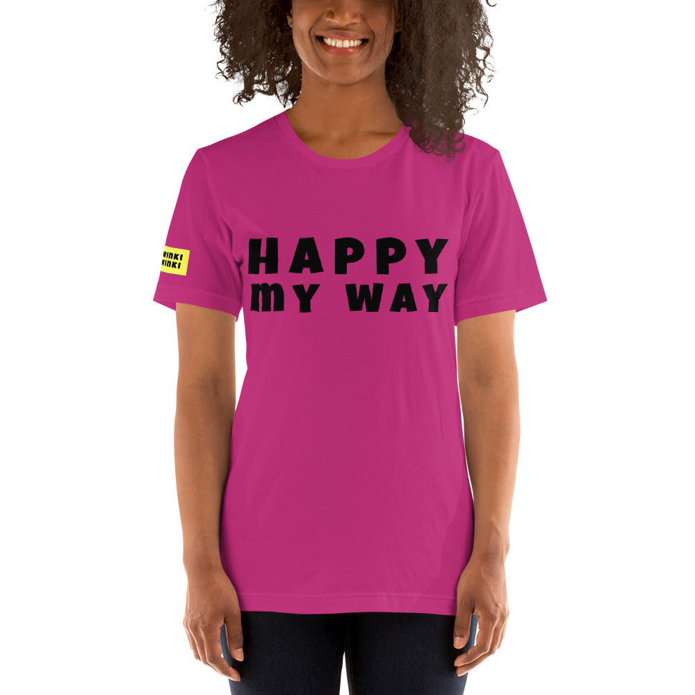 Young woman facing forward wearing cotton slogan tee in berry pink color with slogan Happy My Way in black letters on front.