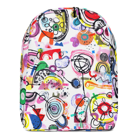Graphic minimal design city style backpack with fun multicolor Treasure Map print and black zipper pulls, front view.