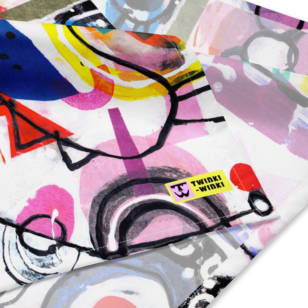 Cheerful, chic, and stylish square scarf with multicolor graphic Treasure Map print. Detail of hem stitching.