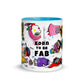 Graphic coffee mug with slogan Born To Be Fab and blue accent color on rim, handle and interior. Colorful Fab Ladies design, front view.