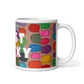Colorful ceramic coffee mug with quirky slogan Just Ducky in white letters on v design, right handle view of 11 ounce mug size.