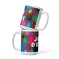 Two stacked colorful ceramic 15 ounce coffee mugs with quirky slogan Just Ducky in white letters on Dripdrop design. 