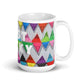 Big colorful ceramic coffee mug with quirky slogan Just Ducky in white letters on Zigzag design, right handle view of 15 ounce mug size.