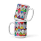 Two stacked colorful ceramic 15 ounce coffee mugs with quirky slogan Just Ducky in white letters on Zigzag design. 