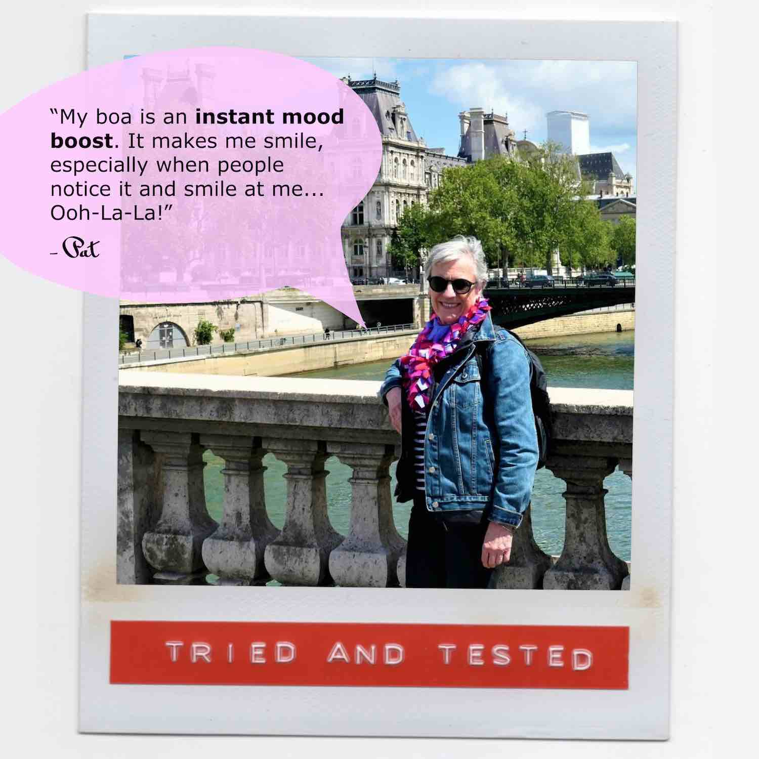 Pat feeling happy wearing her lush colorful fashion boa scarf with denim outfit while walking around Paris.