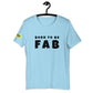 Cotton slogan tee in light blue color with slogan Born To Be Fab in black letters on front.