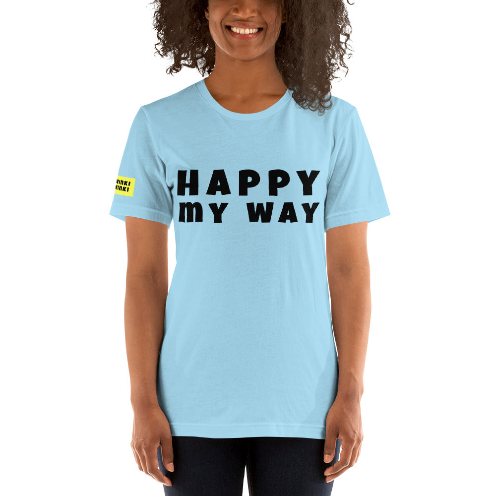 Young woman facing forward wearing cotton slogan tee in light blue color with slogan Happy My Way in black letters on front.