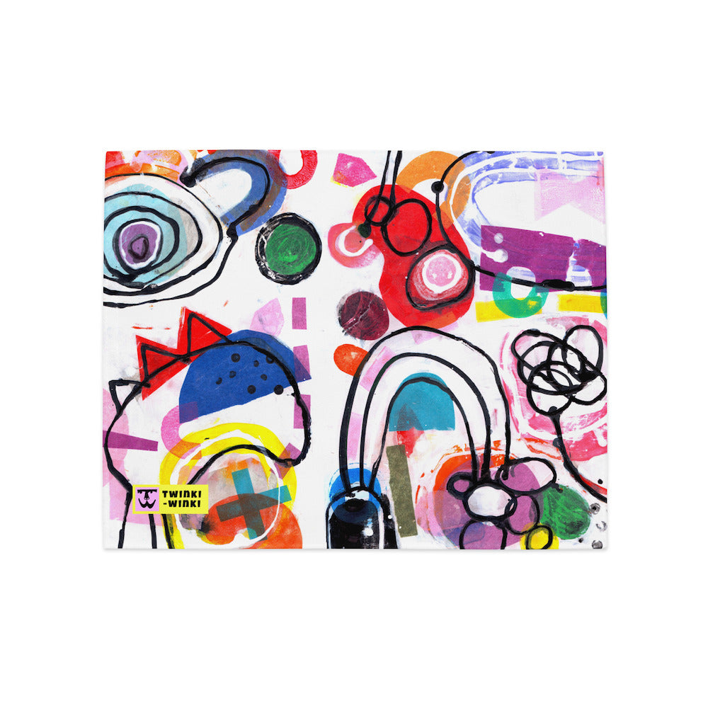 Arty graphic placemat with happy multicolor Treasure Map print in a vibrant, cheerful, and playful style, with folded corner. Design 1 of 4.