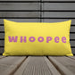 Vibrant, cheerful, and playful style accent pillow on wood deck with a fun Whoopee slogan in pink letters on yellow.