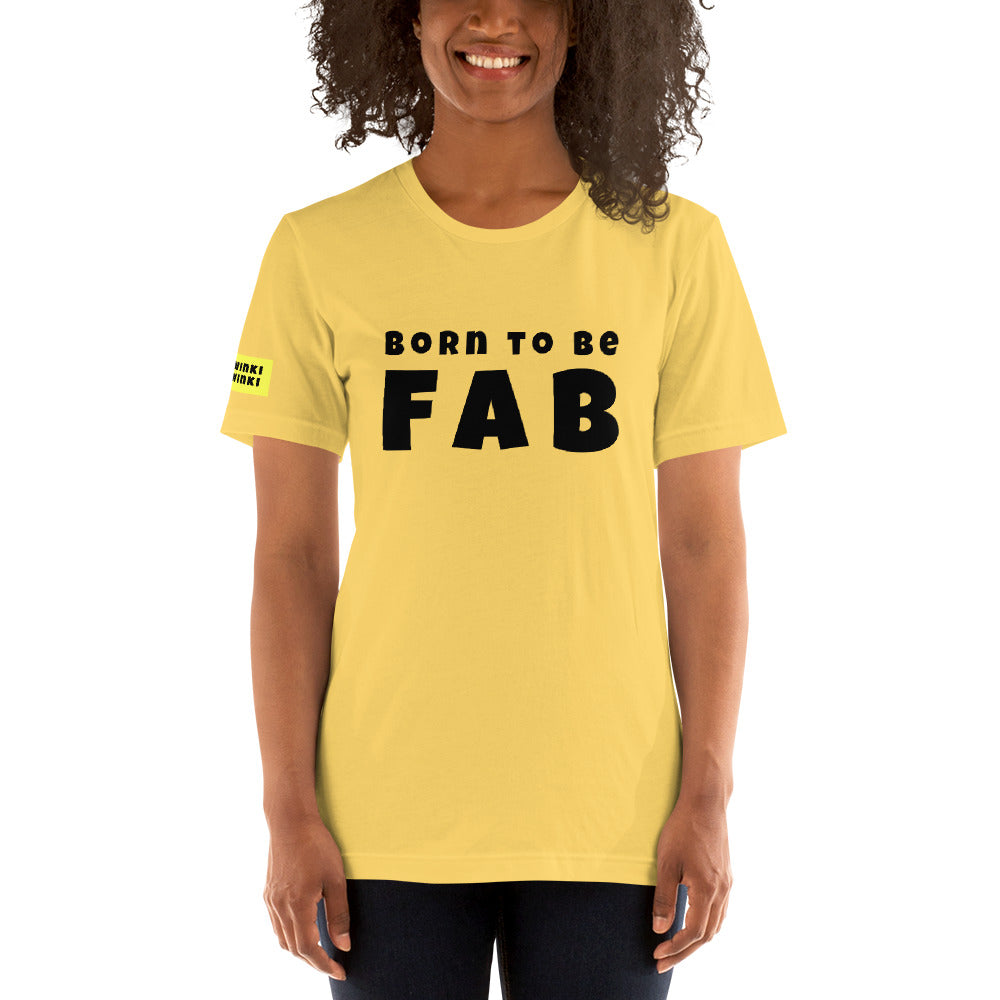 Young woman facing forward wearing cotton slogan tee in yellow color with slogan Born To Be Fab in black letters on front.