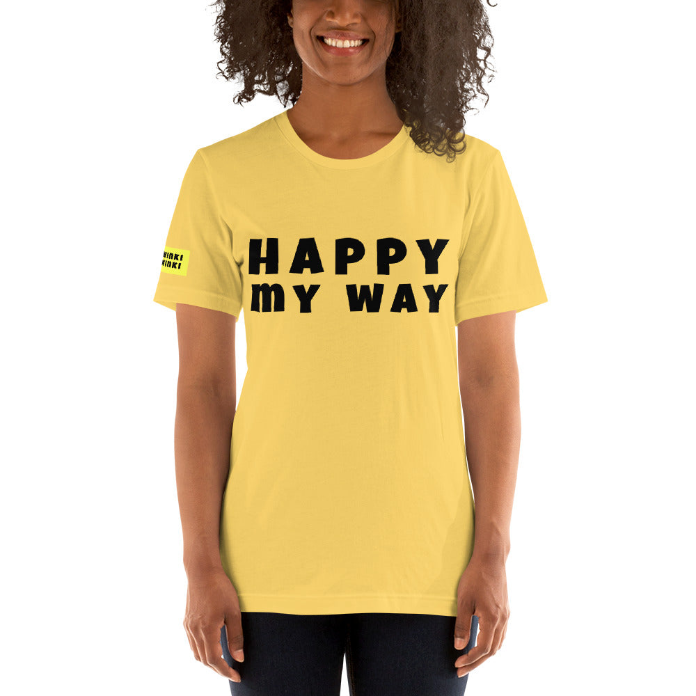 Young woman facing forward wearing cotton slogan tee in yellow color with slogan Happy My Way in black letters on front.