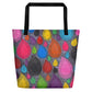 Big sturdy graphic tote bag with multicolor Dripdrop print on reverse and black straps.