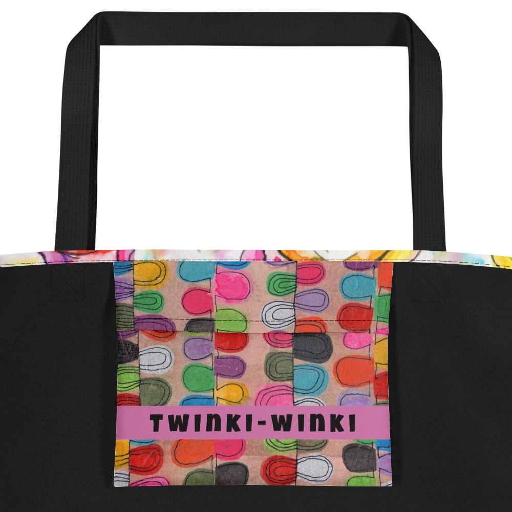 Inside pocket with multicolor Flipflop print and black interior lining of graphic tote bag.