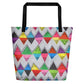 Big sturdy graphic tote bag with multicolor Zigzag print on reverse and black straps.