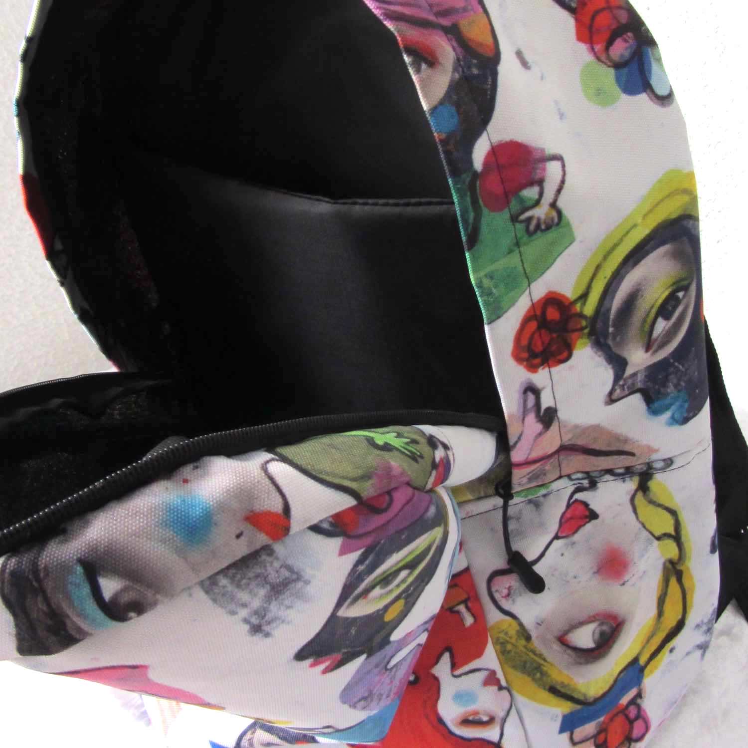 Graphic minimal design city style backpack with fun multicolor Fab Ladies print and black interior padded pocket.