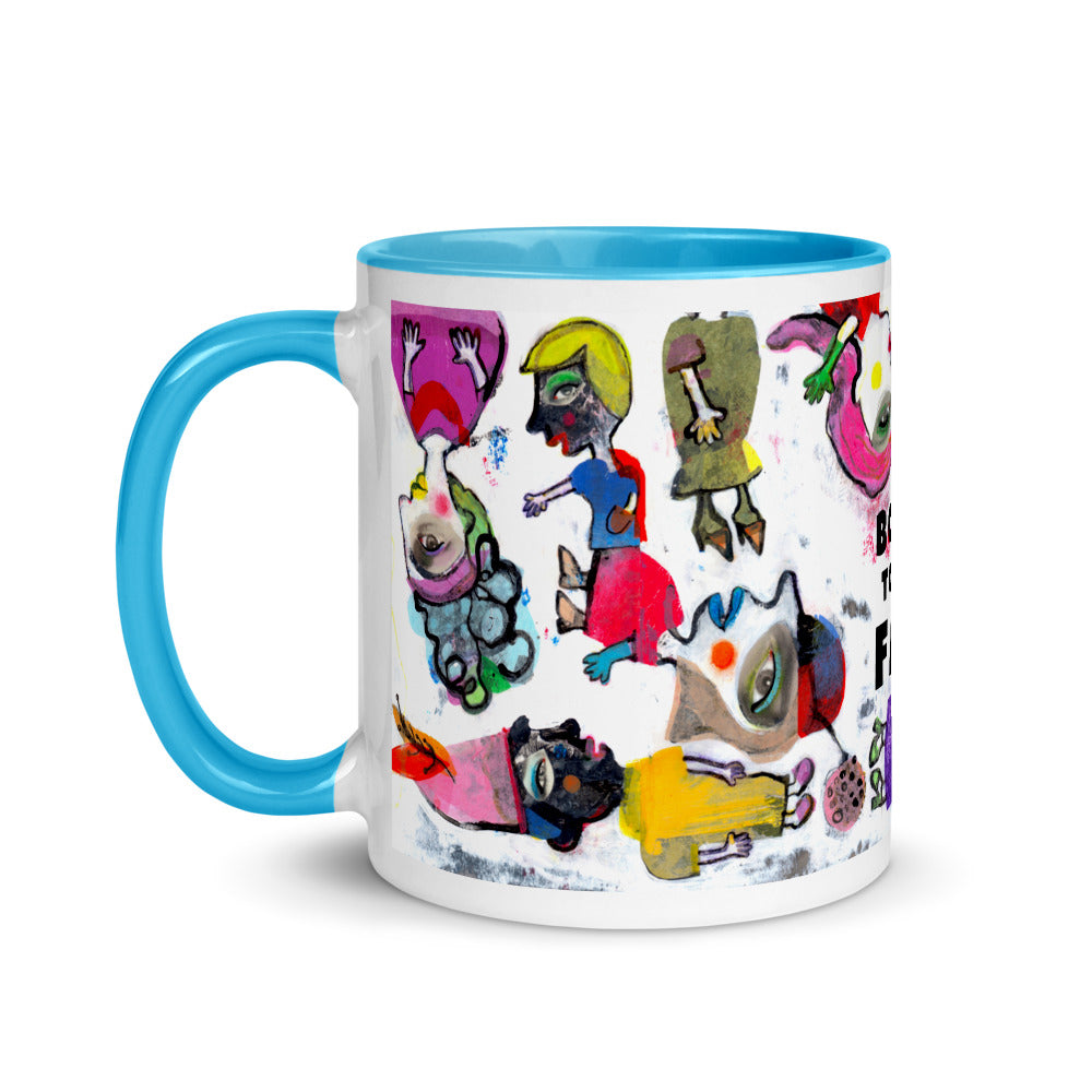 Graphic coffee mug with slogan Born To Be Fab and blue accent color on rim, handle and interior. Colorful Fab Ladies design, left handle view.