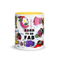 Graphic coffee mug with slogan Born To Be Fab and yellow accent color on rim, handle and interior. Colorful Fab Ladies design, front view.