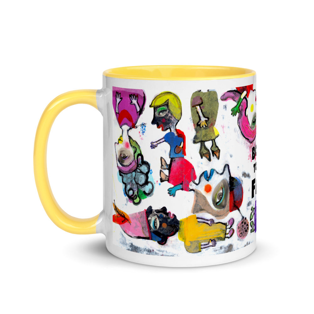 Graphic coffee mug with slogan Born To Be Fab and yellow accent color on rim, handle and interior. Colorful Fab Ladies design, left handle view.