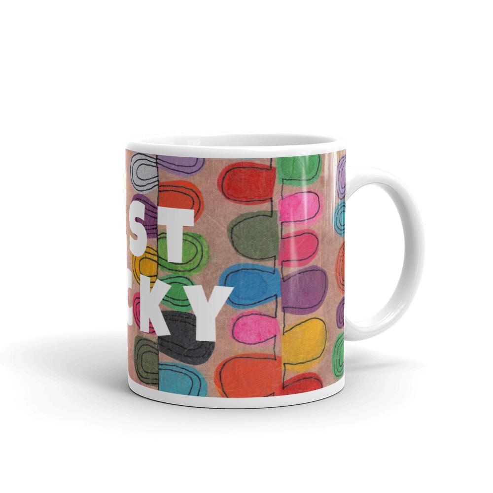 Colorful ceramic coffee mug with quirky slogan Just Ducky in white letters on Flipflop design, right handle view of 11 ounce mug size.