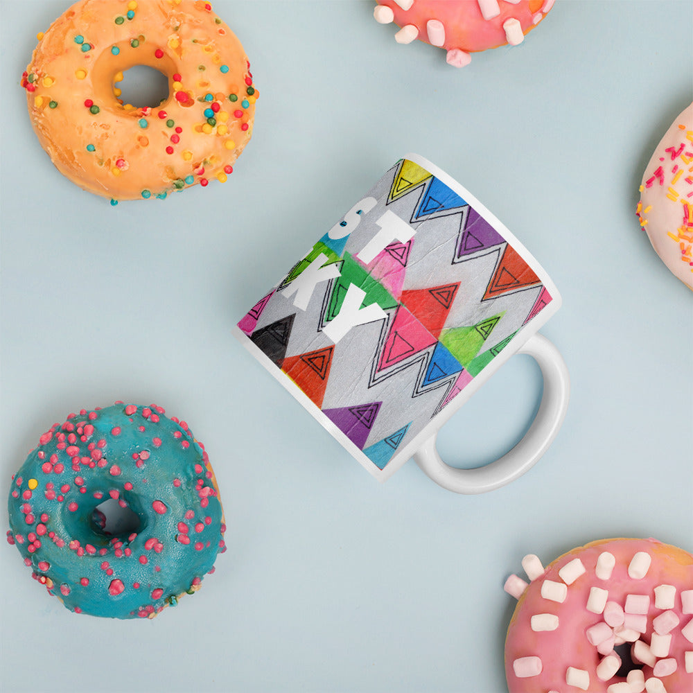 Colorful ceramic coffee mug with quirky slogan Just Ducky in white letters on Flipflop design with happy donuts right view.