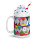 Colorful ceramic coffee mug with quirky slogan Just Ducky in white letters on Flipflop design with whipped cream left view.