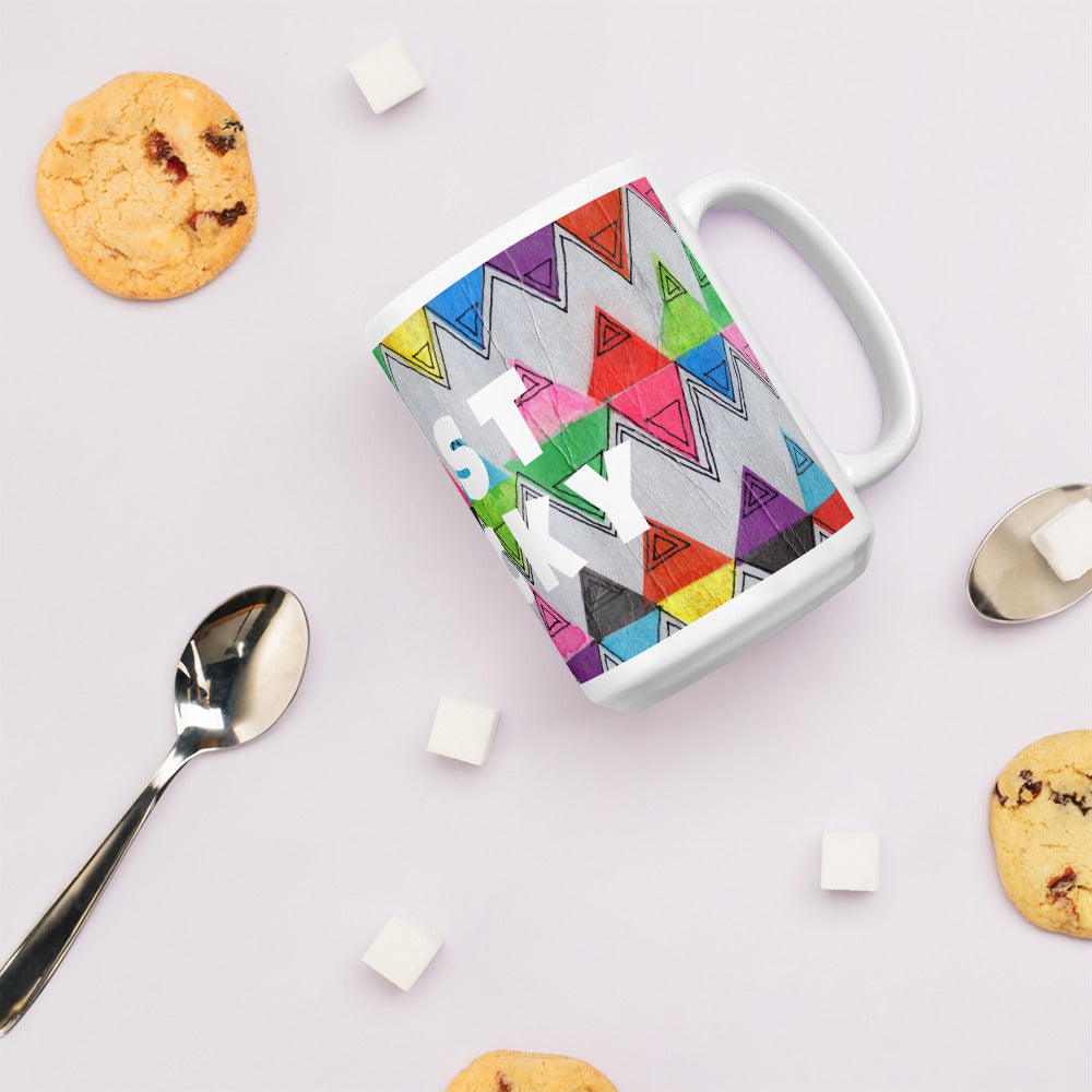 Colorful ceramic coffee mug with quirky slogan Just Ducky in white letters on Flipflop design with cookies right view.