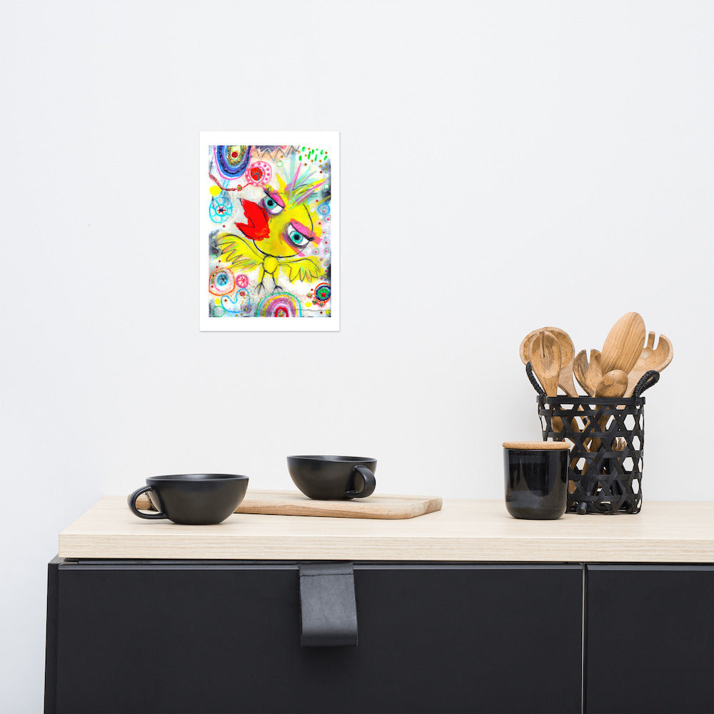 Colorful happy fine art print of a yellow bird singing on vibrant background hanging on wall at stylish counter.