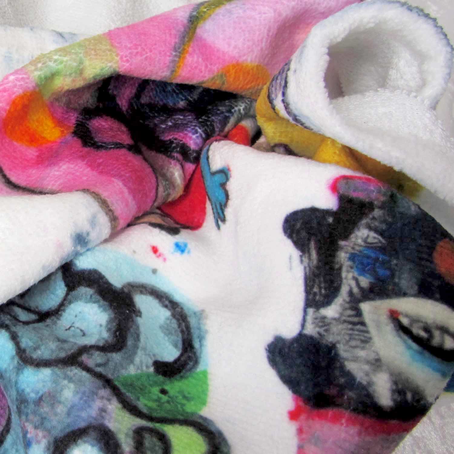 Close-up of stylish soft chic beach towel with bold multicolor Fab Ladies print in vibrant colors view 2.