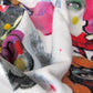 Close-up of stylish soft chic beach towel with bold multicolor Fab Ladies print in vibrant colors view 3.