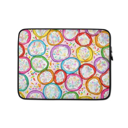 Sturdy graphic laptop case with rainbow-inspired multicolor print in Frosted Cookies design and black zipper binding, 13 inch size.