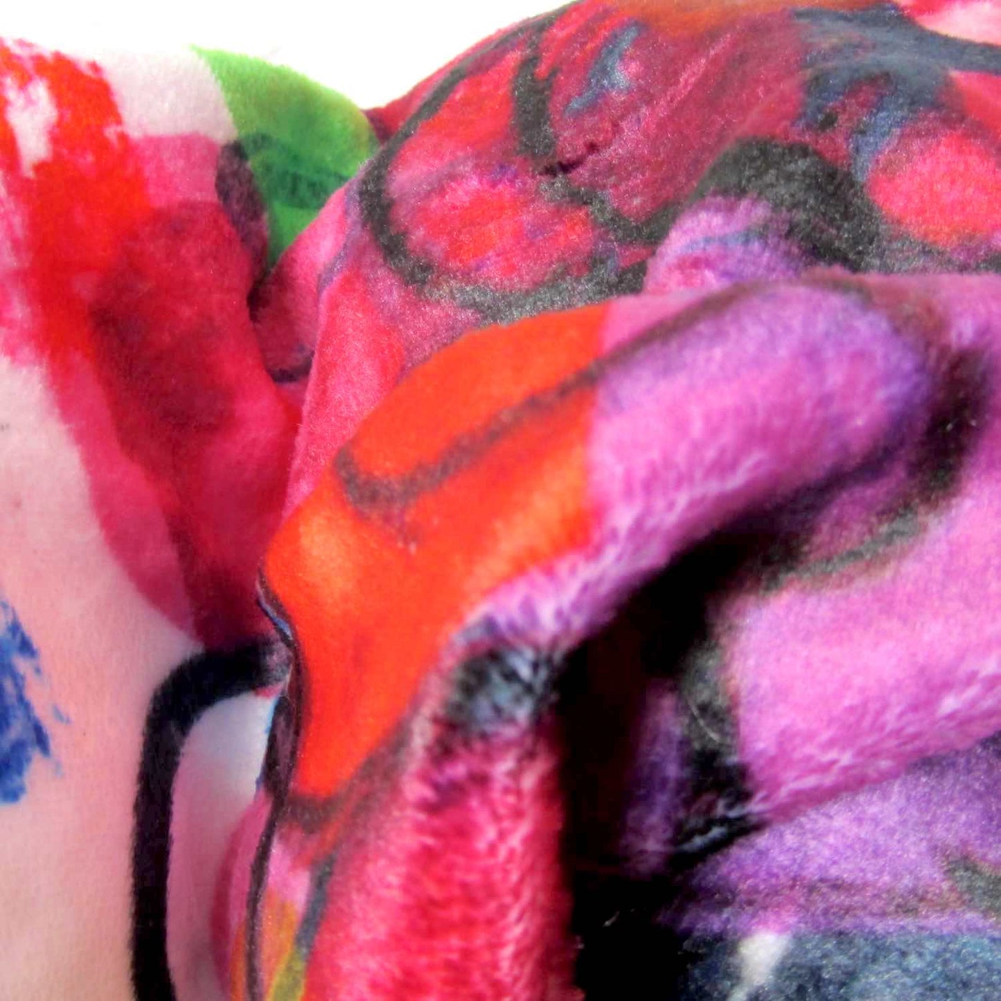 Close-up of soft feel cozy graphic throw blanket with happy multicolor Fab Ladies print in vibrant colors view 2.