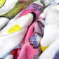 Close-up of soft feel cozy graphic throw blanket with happy multicolor Fab Ladies print in vibrant colors view 4.