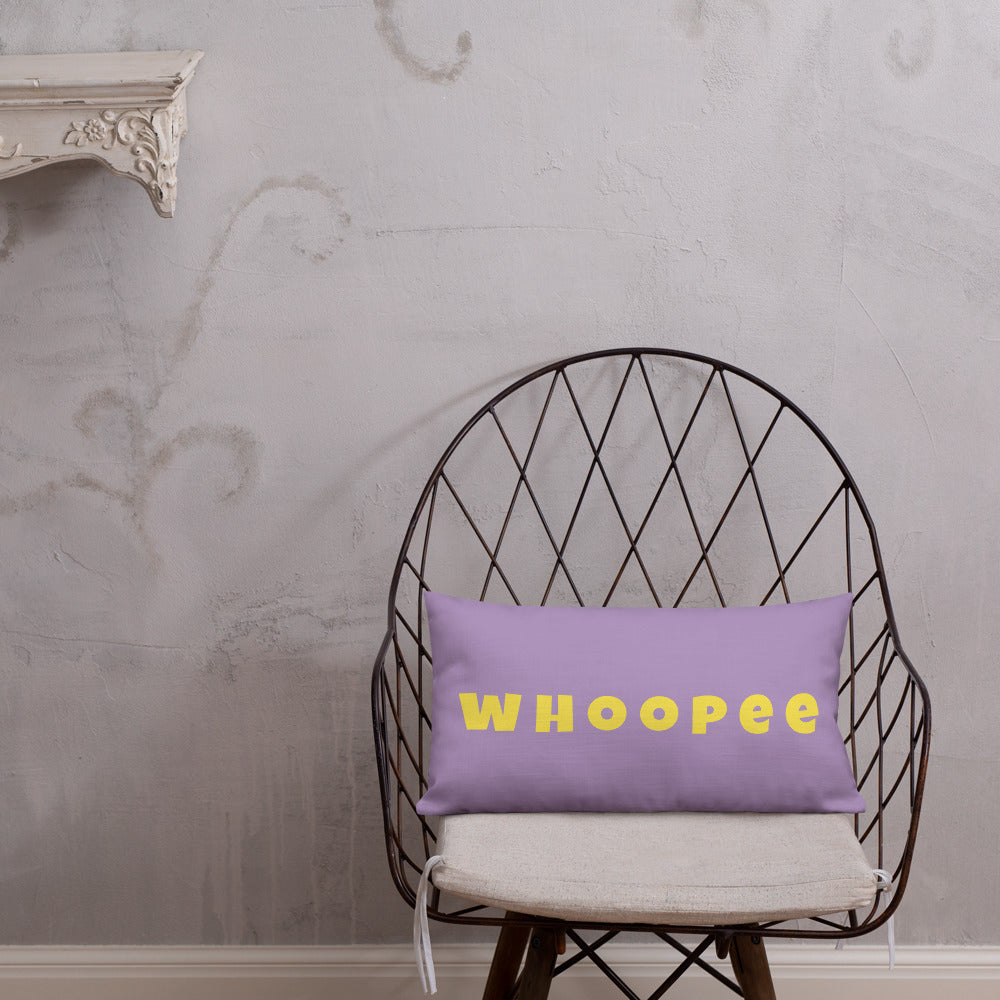Vibrant, cheerful, and playful style accent pillow on modern chair with a fun Whoopee slogan in yellow letters on violet.