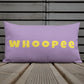 Vibrant, cheerful, and playful style accent pillow on wood deck with a fun Whoopee slogan in yellow letters on violet.