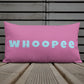 Vibrant, cheerful, and playful style accent pillow on wood deck with a fun Whoopee slogan in cyan letters on pink.