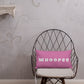 Vibrant, cheerful, and playful style accent pillow on modern chair with a fun Whoopee slogan in platinum letters on pink.